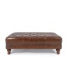 Gepolsterter Fußhocker mit Knopfheftung aus echtem braunem Leder